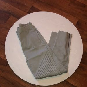 grey pants with sewed design